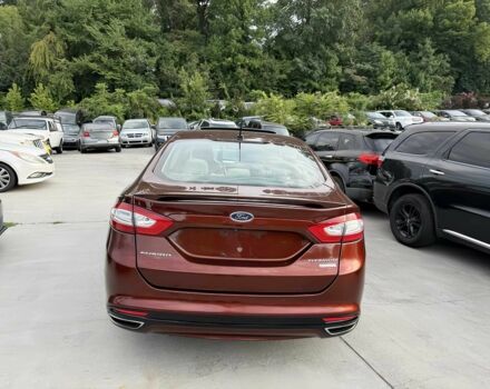 Красный Форд Фьюжн, объемом двигателя 2 л и пробегом 70 тыс. км за 4800 $, фото 5 на Automoto.ua