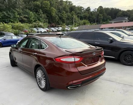 Красный Форд Фьюжн, объемом двигателя 2 л и пробегом 70 тыс. км за 4800 $, фото 6 на Automoto.ua