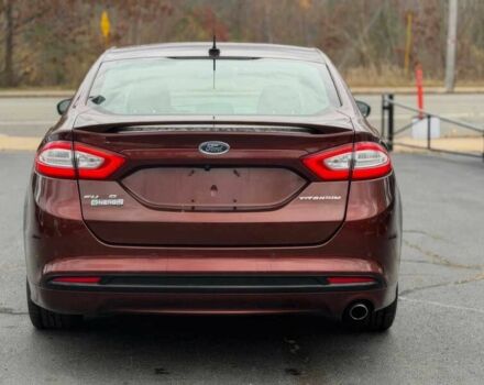 Красный Форд Фьюжн, объемом двигателя 2 л и пробегом 75 тыс. км за 5100 $, фото 4 на Automoto.ua