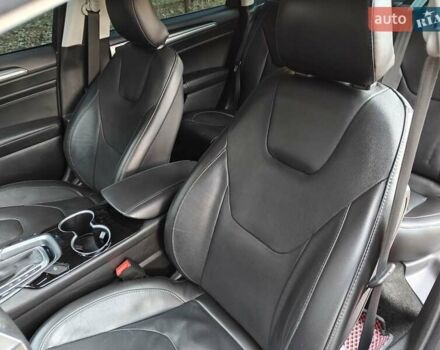 Красный Форд Фьюжн, объемом двигателя 2 л и пробегом 183 тыс. км за 13500 $, фото 32 на Automoto.ua