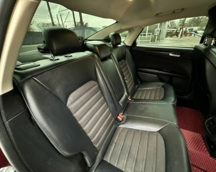 Красный Форд Фьюжн, объемом двигателя 2 л и пробегом 118 тыс. км за 337 $, фото 10 на Automoto.ua