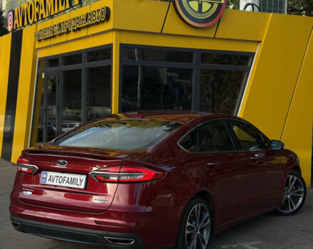 Червоний Форд Фьюжен, об'ємом двигуна 2 л та пробігом 207 тис. км за 12999 $, фото 4 на Automoto.ua