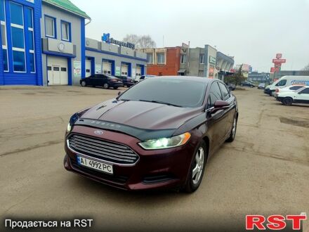Красный Форд Фьюжн, объемом двигателя 1.6 л и пробегом 246 тыс. км за 6000 $, фото 1 на Automoto.ua
