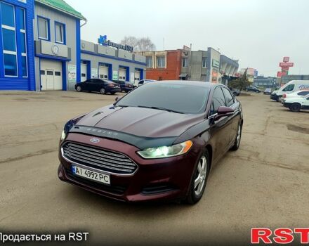 Красный Форд Фьюжн, объемом двигателя 1.6 л и пробегом 246 тыс. км за 6000 $, фото 1 на Automoto.ua