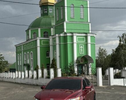 Красный Форд Фьюжн, объемом двигателя 2 л и пробегом 205 тыс. км за 11866 $, фото 1 на Automoto.ua