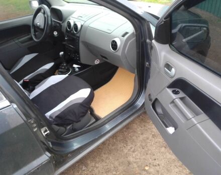 Серый Форд Фьюжн, объемом двигателя 1.4 л и пробегом 241 тыс. км за 3500 $, фото 9 на Automoto.ua