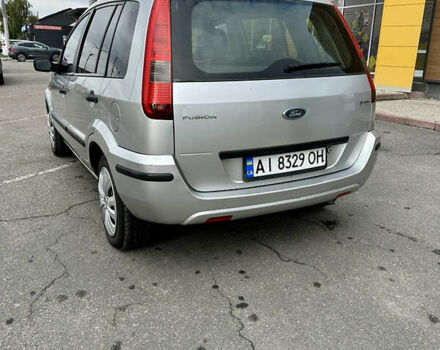 Серый Форд Фьюжн, объемом двигателя 1.39 л и пробегом 250 тыс. км за 3950 $, фото 12 на Automoto.ua
