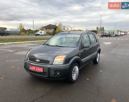 Серый Форд Фьюжн, объемом двигателя 1.6 л и пробегом 149 тыс. км за 5399 $, фото 6 на Automoto.ua