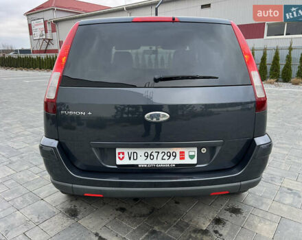 Серый Форд Фьюжн, объемом двигателя 1.6 л и пробегом 218 тыс. км за 6950 $, фото 21 на Automoto.ua