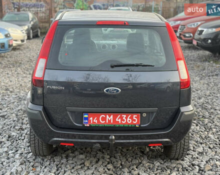 Серый Форд Фьюжн, объемом двигателя 1.4 л и пробегом 152 тыс. км за 6499 $, фото 4 на Automoto.ua