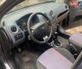 Серый Форд Фьюжн, объемом двигателя 1.6 л и пробегом 149 тыс. км за 6100 $, фото 4 на Automoto.ua