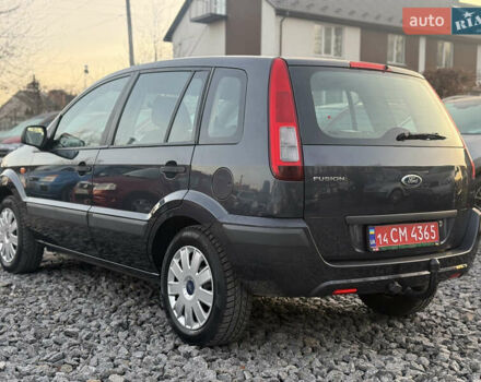 Серый Форд Фьюжн, объемом двигателя 1.4 л и пробегом 152 тыс. км за 6499 $, фото 5 на Automoto.ua