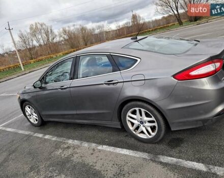 Серый Форд Фьюжн, объемом двигателя 1.6 л и пробегом 198 тыс. км за 8300 $, фото 6 на Automoto.ua