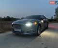 Серый Форд Фьюжн, объемом двигателя 2 л и пробегом 240 тыс. км за 9800 $, фото 1 на Automoto.ua