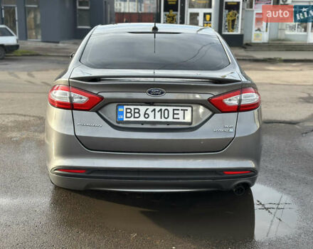 Серый Форд Фьюжн, объемом двигателя 2 л и пробегом 244 тыс. км за 9650 $, фото 5 на Automoto.ua