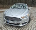 Серый Форд Фьюжн, объемом двигателя 2.5 л и пробегом 143 тыс. км за 10500 $, фото 1 на Automoto.ua
