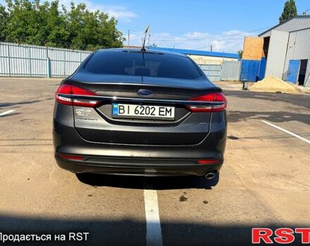 Серый Форд Фьюжн, объемом двигателя 2.5 л и пробегом 100 тыс. км за 12500 $, фото 4 на Automoto.ua