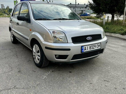 Серый Форд Фьюжн, объемом двигателя 1.39 л и пробегом 250 тыс. км за 3950 $, фото 1 на Automoto.ua