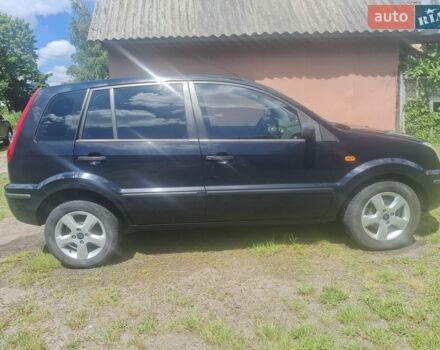 Синій Форд Фьюжен, об'ємом двигуна 1.4 л та пробігом 252 тис. км за 3700 $, фото 4 на Automoto.ua