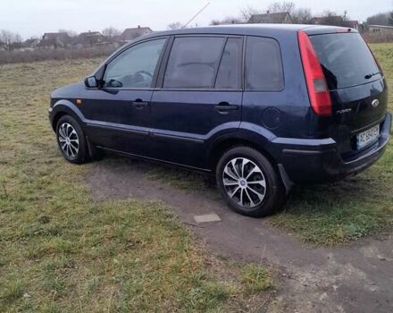 Синій Форд Фьюжен, об'ємом двигуна 1.39 л та пробігом 200 тис. км за 4200 $, фото 4 на Automoto.ua