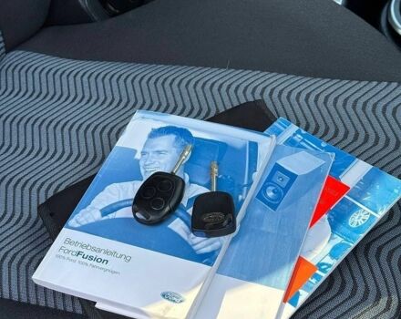 Синій Форд Фьюжен, об'ємом двигуна 1.39 л та пробігом 190 тис. км за 5450 $, фото 23 на Automoto.ua