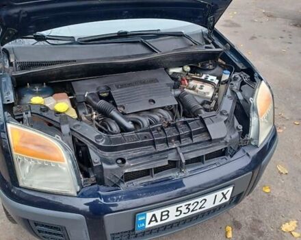 Синій Форд Фьюжен, об'ємом двигуна 1.39 л та пробігом 225 тис. км за 4200 $, фото 6 на Automoto.ua