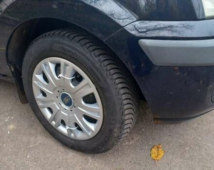 Синій Форд Фьюжен, об'ємом двигуна 1.39 л та пробігом 225 тис. км за 4200 $, фото 5 на Automoto.ua