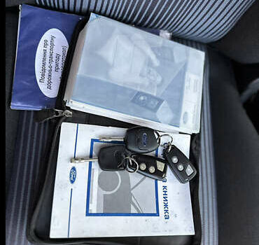 Синий Форд Фьюжн, объемом двигателя 1.4 л и пробегом 250 тыс. км за 4500 $, фото 20 на Automoto.ua