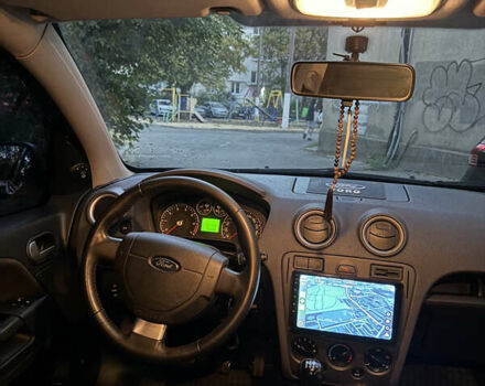 Синій Форд Фьюжен, об'ємом двигуна 1.39 л та пробігом 131 тис. км за 5600 $, фото 5 на Automoto.ua