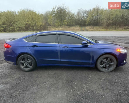 Синій Форд Фьюжен, об'ємом двигуна 2 л та пробігом 265 тис. км за 9300 $, фото 4 на Automoto.ua