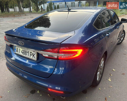 Синій Форд Фьюжен, об'ємом двигуна 2.49 л та пробігом 143 тис. км за 11100 $, фото 4 на Automoto.ua