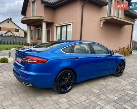 Синій Форд Фьюжен, об'ємом двигуна 2 л та пробігом 170 тис. км за 12300 $, фото 4 на Automoto.ua