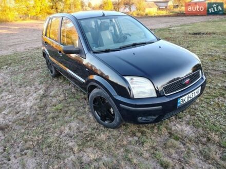 Синий Форд Фьюжн, объемом двигателя 1.4 л и пробегом 255 тыс. км за 3900 $, фото 1 на Automoto.ua