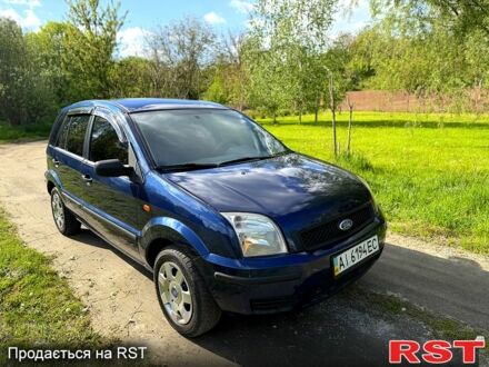 Синий Форд Фьюжн, объемом двигателя 1.4 л и пробегом 240 тыс. км за 3500 $, фото 1 на Automoto.ua