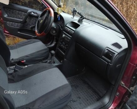 Красный Форд ГТ, объемом двигателя 1.6 л и пробегом 318 тыс. км за 2450 $, фото 6 на Automoto.ua