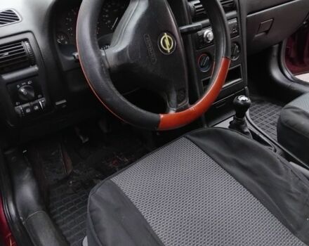 Красный Форд ГТ, объемом двигателя 1.6 л и пробегом 318 тыс. км за 2450 $, фото 5 на Automoto.ua