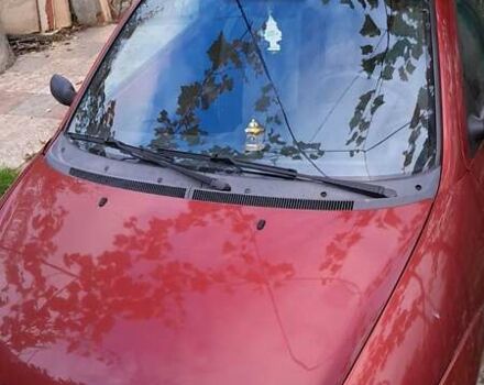 Красный Форд КА, объемом двигателя 1.3 л и пробегом 165 тыс. км за 2914 $, фото 1 на Automoto.ua