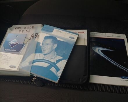 Черный Форд Куга, объемом двигателя 2 л и пробегом 259 тыс. км за 10600 $, фото 13 на Automoto.ua