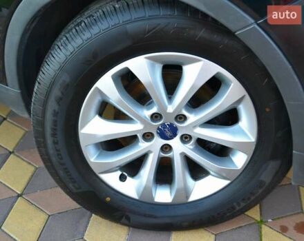 Черный Форд Куга, объемом двигателя 2 л и пробегом 228 тыс. км за 10450 $, фото 17 на Automoto.ua