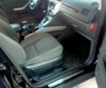Черный Форд Куга, объемом двигателя 2 л и пробегом 200 тыс. км за 9700 $, фото 3 на Automoto.ua