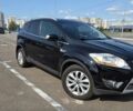 Черный Форд Куга, объемом двигателя 2 л и пробегом 270 тыс. км за 10700 $, фото 1 на Automoto.ua