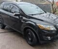 Черный Форд Куга, объемом двигателя 2 л и пробегом 150 тыс. км за 13500 $, фото 1 на Automoto.ua