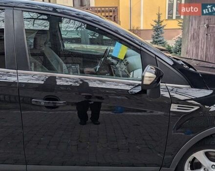 Черный Форд Куга, объемом двигателя 2 л и пробегом 260 тыс. км за 11490 $, фото 1 на Automoto.ua