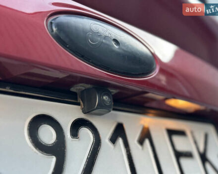 Красный Форд Куга, объемом двигателя 2 л и пробегом 169 тыс. км за 13555 $, фото 98 на Automoto.ua