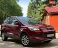 Красный Форд Куга, объемом двигателя 2 л и пробегом 150 тыс. км за 13950 $, фото 1 на Automoto.ua