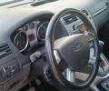 Серый Форд Куга, объемом двигателя 2 л и пробегом 213 тыс. км за 9500 $, фото 4 на Automoto.ua