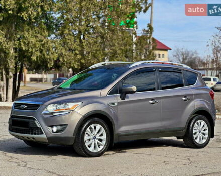 Серый Форд Куга, объемом двигателя 2 л и пробегом 127 тыс. км за 11950 $, фото 1 на Automoto.ua