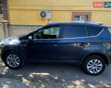 Синий Форд Куга, объемом двигателя 2 л и пробегом 212 тыс. км за 11099 $, фото 2 на Automoto.ua
