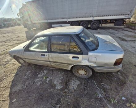 Серый Форд Лазер, объемом двигателя 0 л и пробегом 566 тыс. км за 440 $, фото 3 на Automoto.ua