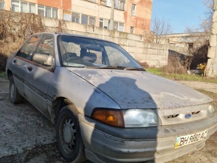 Серый Форд Лазер, объемом двигателя 0 л и пробегом 566 тыс. км за 440 $, фото 1 на Automoto.ua